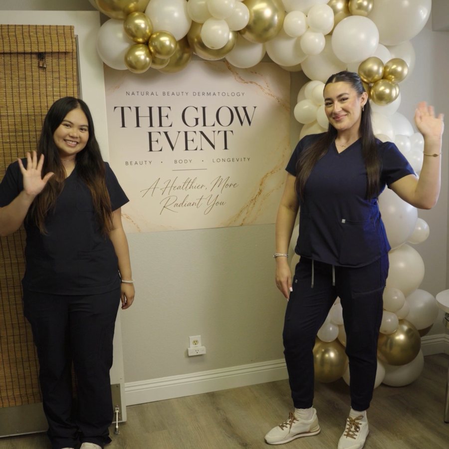 The Glow Event signage and balloon installation at the clinic
